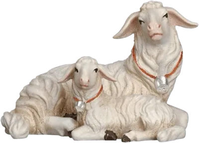 Hand-carved wooden sheep lying with lamb, white with orange collars and silver bells