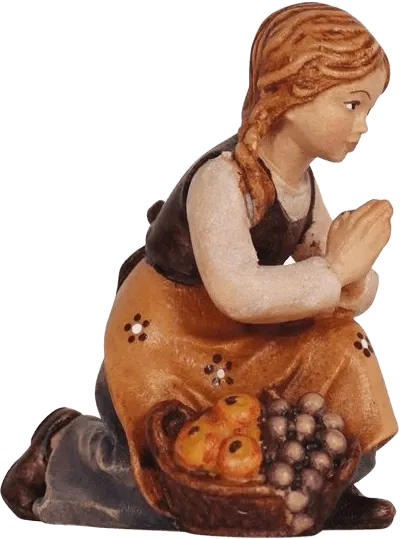 Hand-carved wooden figure of a girl kneeling in prayer with a basket of fruit, hand-painted in warm colors